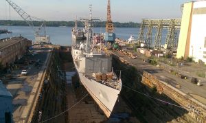 dry docked ship being prepared for ship repairs