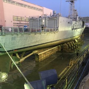 dry docked ship being prepared for boat repairs