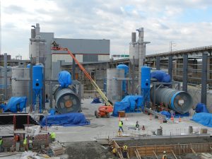 construction site with custom metal fabricated components instillation